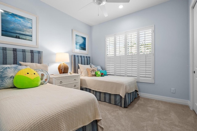 bedroom with recessed lighting, carpet flooring, a ceiling fan, and baseboards