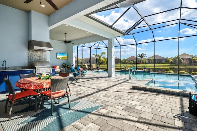 outdoor pool with a lanai, area for grilling, a patio area, and ceiling fan