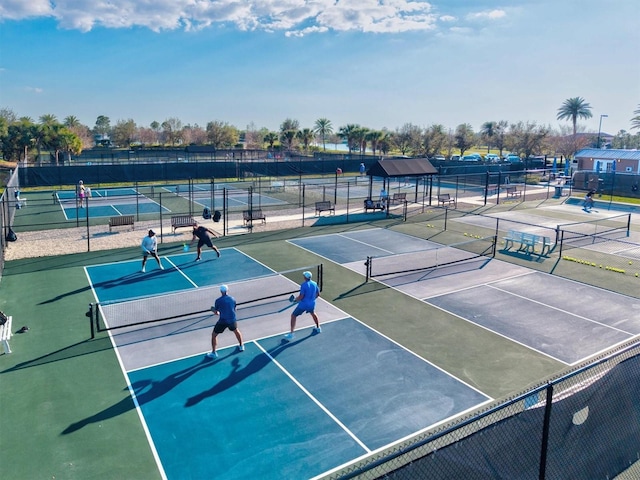 view of sport court featuring community basketball court and fence