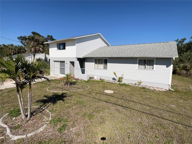 5104 Silver Bell Dr, Port Charlotte, FL 33948 - view of front of home featuring a front yard, a garage, and a shingled roof