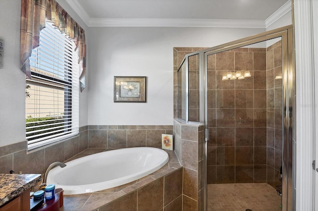 full bathroom featuring a stall shower, vanity, a garden tub, and ornamental molding