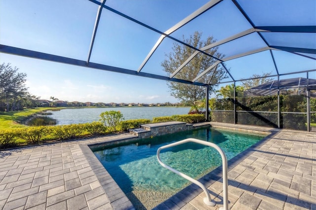 pool featuring a water view, a patio, and a lanai