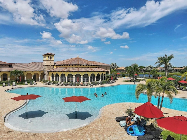 community pool featuring a patio