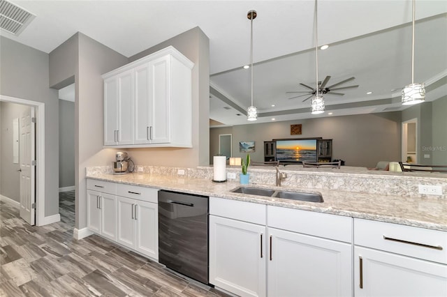 kitchen with visible vents, dishwashing machine, recessed lighting, white cabinetry, and a sink