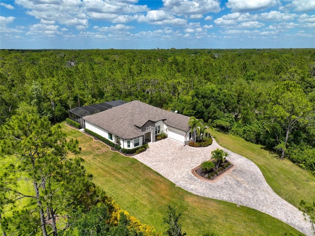 aerial view featuring a forest view