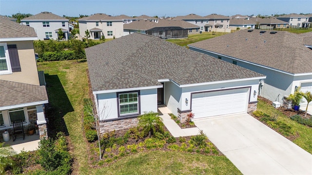 ranch-style house with a residential view, concrete driveway, stucco siding, stone siding, and an attached garage