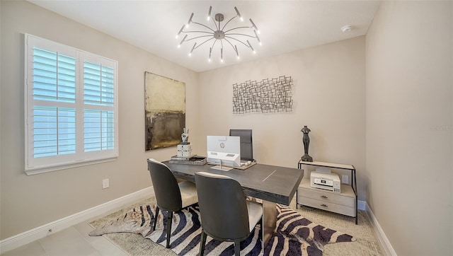 office space with a chandelier and baseboards