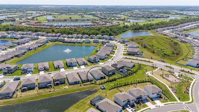 birds eye view of property featuring a residential view and a water view