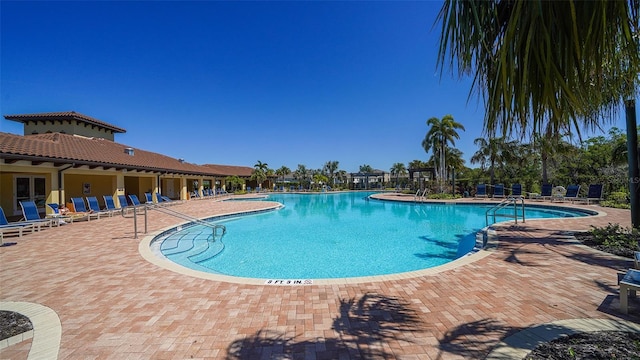 pool with a patio area