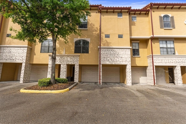 view of property featuring an attached garage