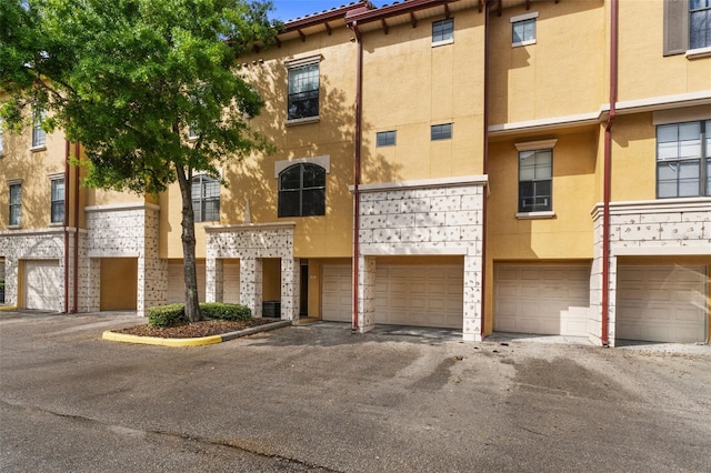 view of building exterior featuring a garage