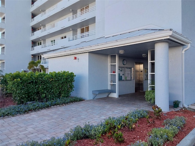 view of property with elevator