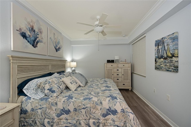 bedroom with baseboards, crown molding, dark wood-type flooring, and a ceiling fan