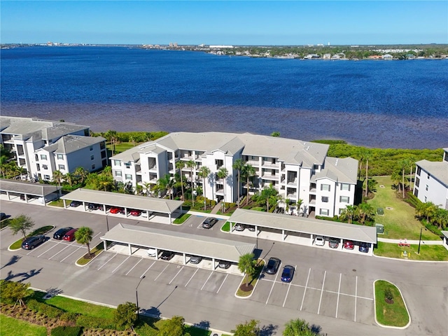 drone / aerial view with a water view