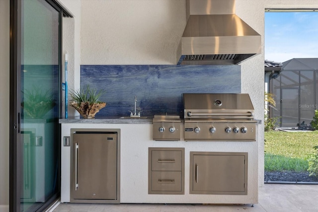 view of patio with a sink, grilling area, and an outdoor kitchen