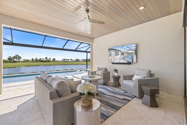 view of patio with a ceiling fan, a lanai, an outdoor pool, and an outdoor living space