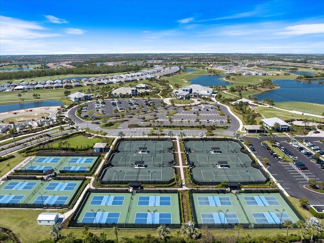 bird's eye view featuring a residential view and a water view