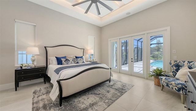 tiled bedroom featuring french doors, baseboards, ceiling fan, and access to outside