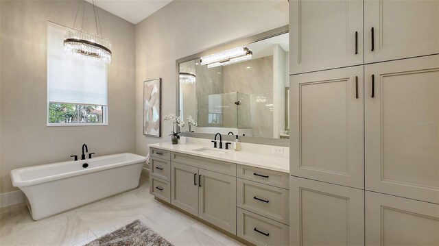 full bathroom featuring a shower stall, a freestanding bath, vanity, and marble finish floor