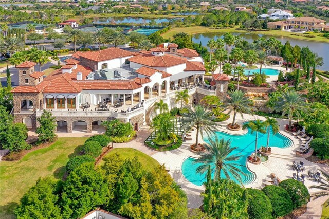 birds eye view of property featuring a water view