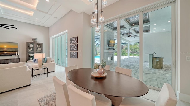 8348 Catamaran Cir, Lakewood Ranch, FL 34202 - dining space with ceiling fan, a towering ceiling, light tile patterned floors, and recessed lighting