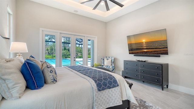 8348 Catamaran Cir, Lakewood Ranch, FL 34202 - bedroom featuring a ceiling fan, baseboards, french doors, and access to exterior