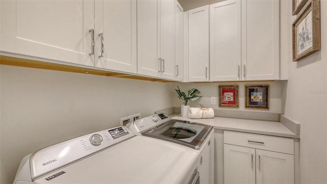 8348 Catamaran Cir, Lakewood Ranch, FL 34202 - laundry room featuring separate washer and dryer and cabinet space