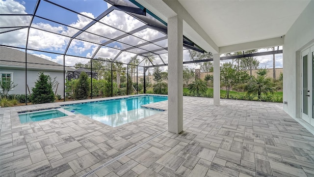 8348 Catamaran Cir, Lakewood Ranch, FL 34202 - view of swimming pool with a patio area, a pool with connected hot tub, and glass enclosure