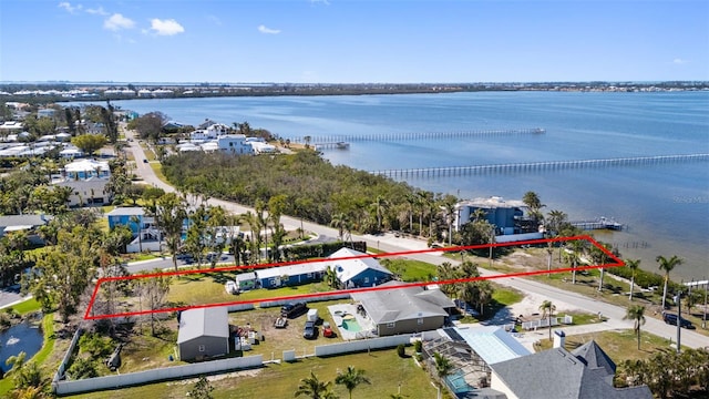 birds eye view of property featuring a water view