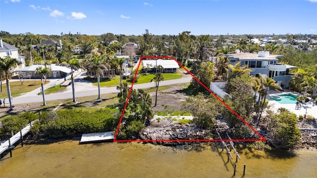 birds eye view of property with a residential view