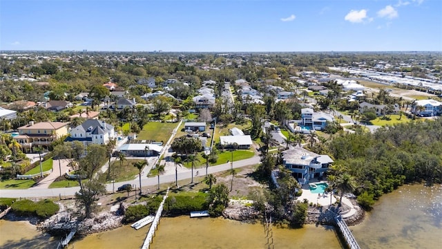 birds eye view of property with a residential view