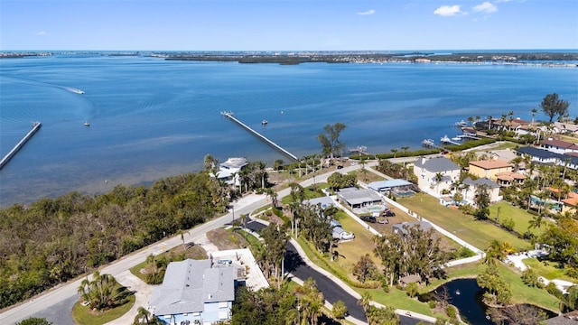 bird's eye view with a residential view and a water view