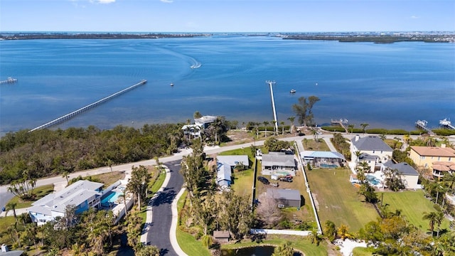 birds eye view of property featuring a residential view and a water view