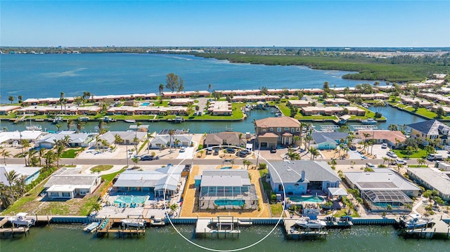 aerial view featuring a water view and a residential view