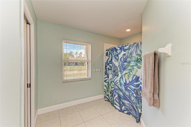 1127 133rd St E, Bradenton, FL 34212 - bathroom with a shower with curtain, tile patterned flooring, baseboards, and recessed lighting