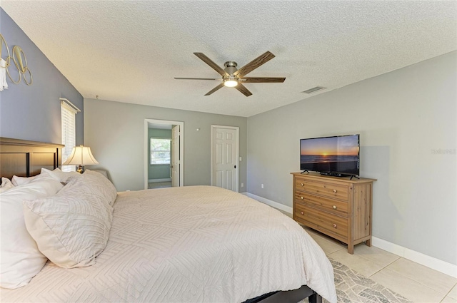 1127 133rd St E, Bradenton, FL 34212 - bedroom featuring baseboards, a textured ceiling, and visible vents