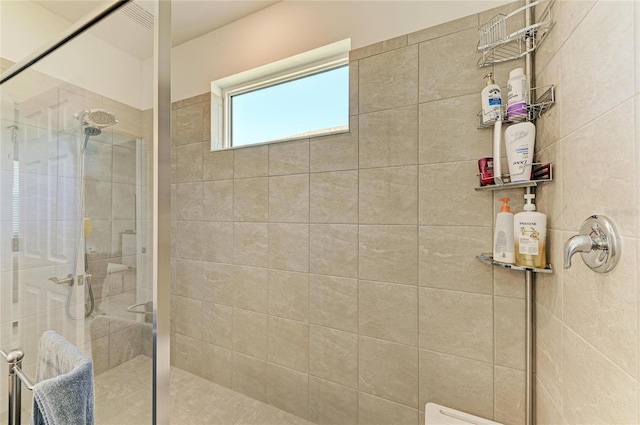 full bathroom featuring a stall shower