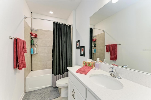 bathroom featuring vanity, toilet, and shower / bath combo