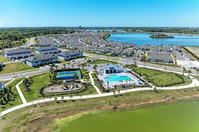 bird's eye view featuring a residential view and a water view