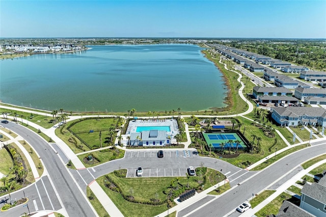 drone / aerial view with a water view