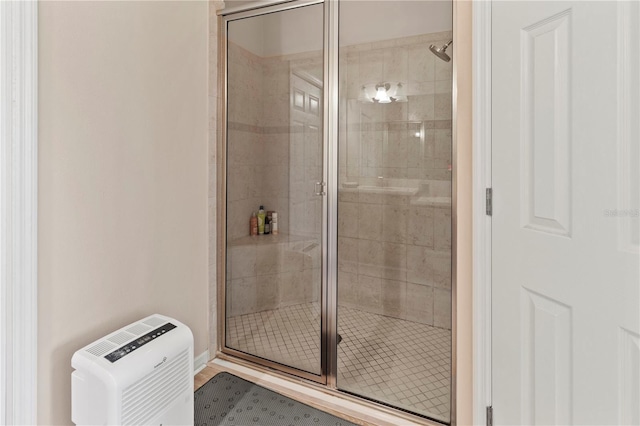 full bathroom featuring a shower stall