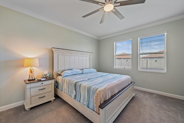 bedroom featuring baseboards, carpet, ceiling fan, and crown molding