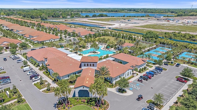 birds eye view of property featuring a water view