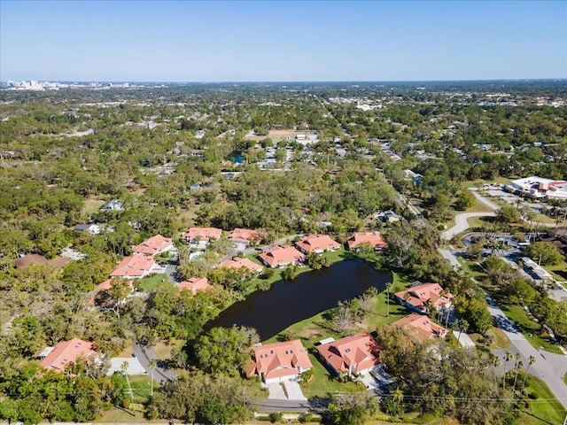 aerial view featuring a residential view and a water view