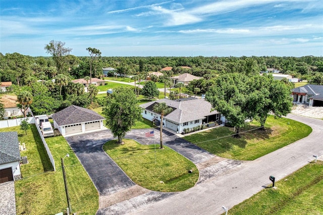 birds eye view of property with a residential view