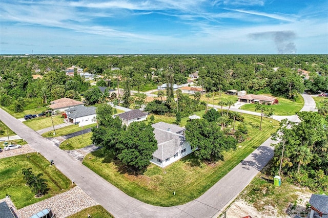 drone / aerial view with a view of trees