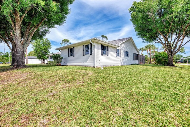 exterior space with a lawn