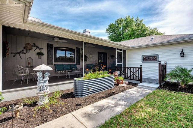 property entrance featuring covered porch and ceiling fan