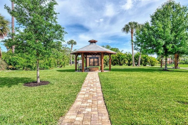 surrounding community featuring a gazebo and a yard