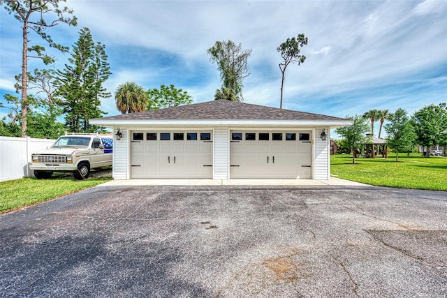 detached garage with fence